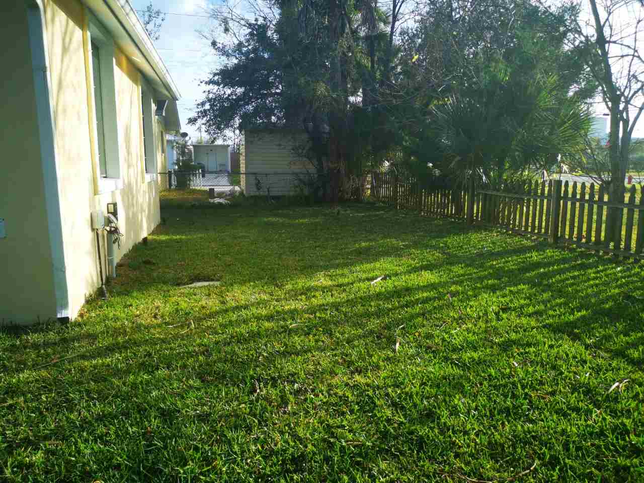 170 Twine Street St. Augustine, FL 32084 - Photo 22 of 24 a view of a porch with a yard