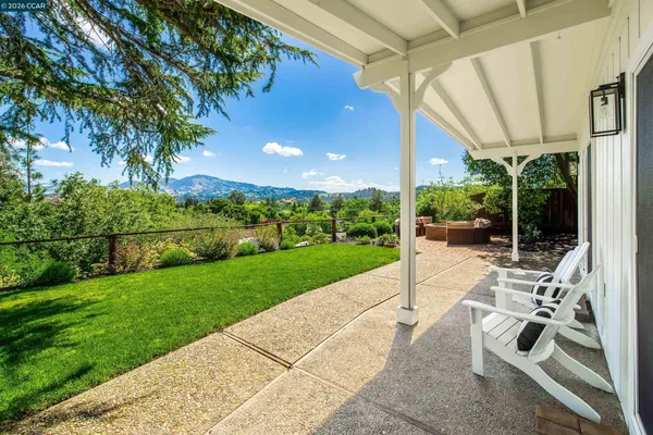 a outdoor living space with furniture and garden view