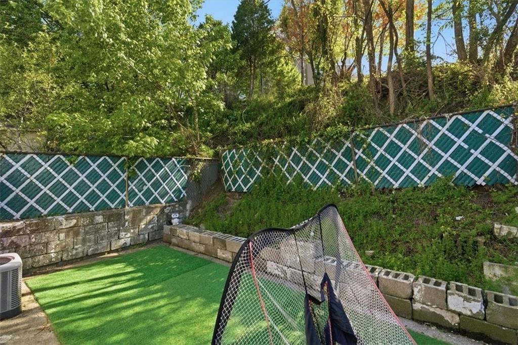 246 Dunseith Street Pittsburgh, PA 15213 - Photo 24 of 36 a garden view with a seating space