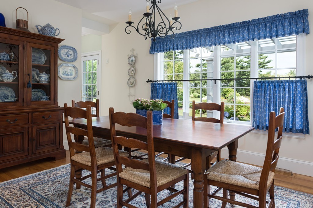 19 North Glen Drive Mashpee, MA 02649 - Photo 17 of 30 a view of a dining room with furniture window and outside view