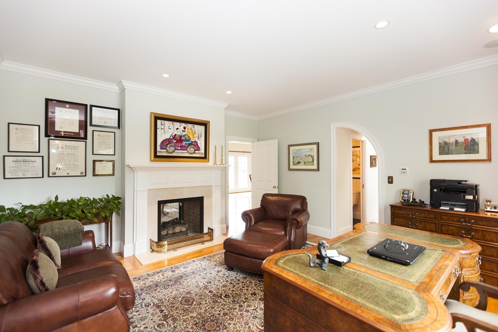 19 North Glen Drive Mashpee, MA 02649 - Photo 18 of 30 a living room with furniture and a fireplace