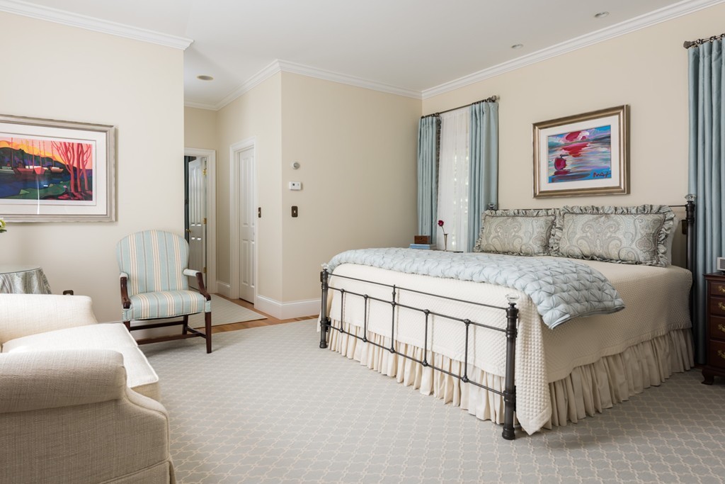 19 North Glen Drive Mashpee, MA 02649 - Photo 20 of 30 a bedroom with a bed and a couch