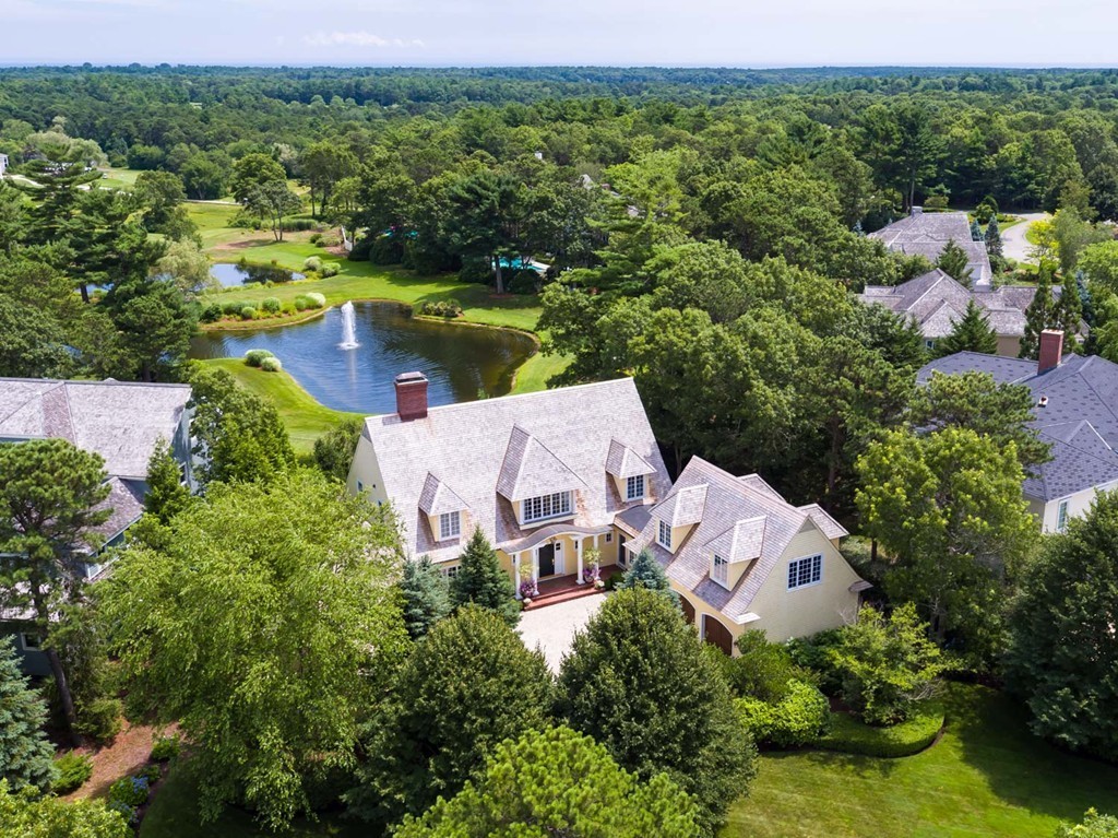 19 North Glen Drive Mashpee, MA 02649 - Photo 2 of 30 an aerial view of a house with lots of trees