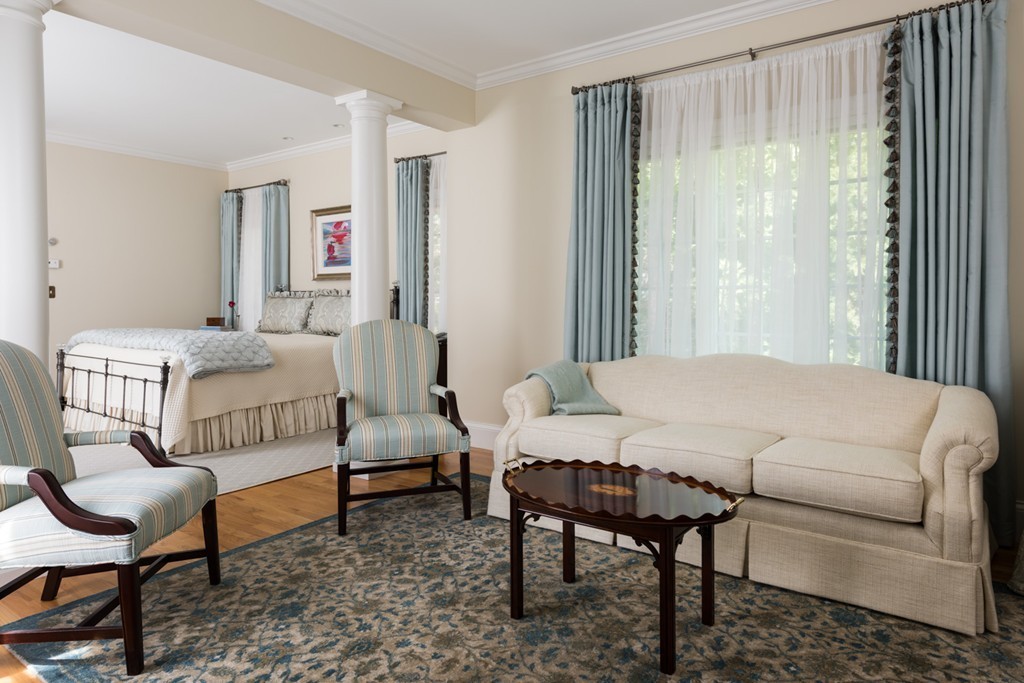 19 North Glen Drive Mashpee, MA 02649 - Photo 22 of 30 a living room with furniture and a large window