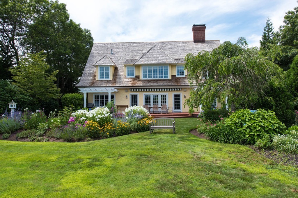 19 North Glen Drive Mashpee, MA 02649 - Photo 6 of 30 a front view of house with yard and green space