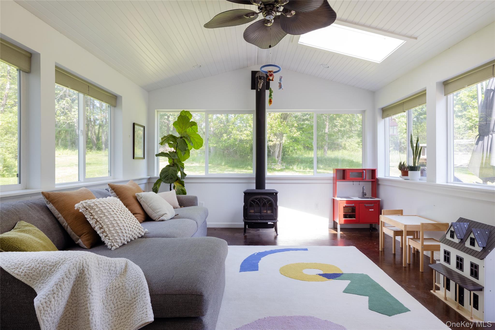 185 Verbank Village Road Millbrook, NY 12545 - Photo 10 of 22 a living room with furniture and a large window