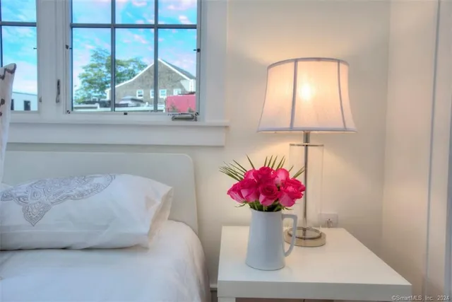 a view of a dining room with a table and chair