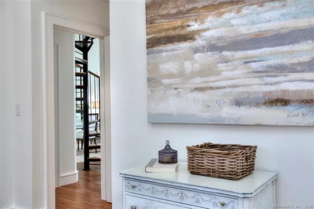 a bed room with a bed and a chair