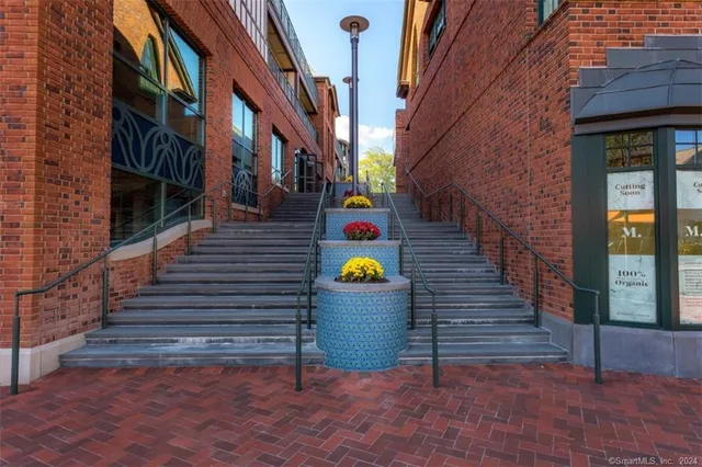 a view of a couch in front of a building