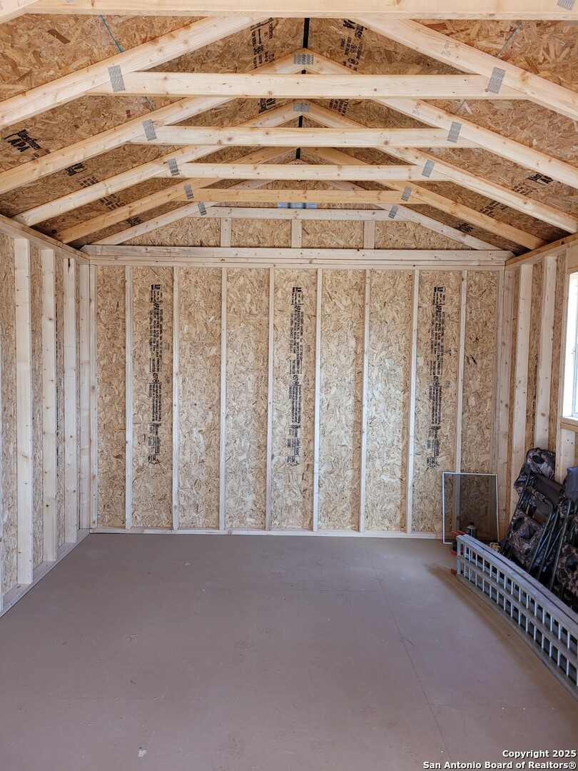 234 Pvt Road Sabinal, TX 78881 - Photo 29 of 32 a view of a room with wooden walls