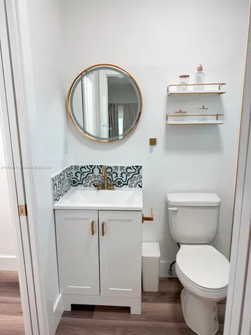 a bathroom with a sink and a toilet