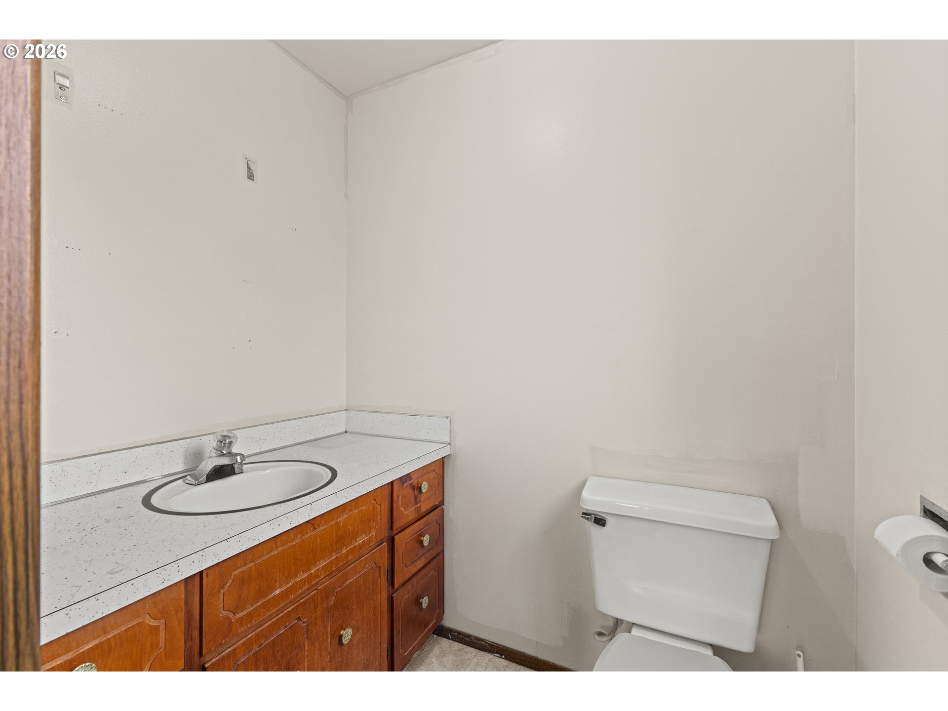 1816 Sunset Court Myrtle Point, OR 97458 - Photo 35 of 42 a bathroom with a sink toilet and a mirror