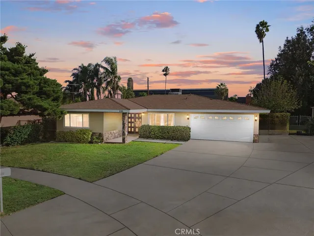 a white toilet sitting next to a shower