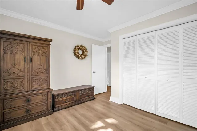 a bathroom with a double vanity sink toilet and shower