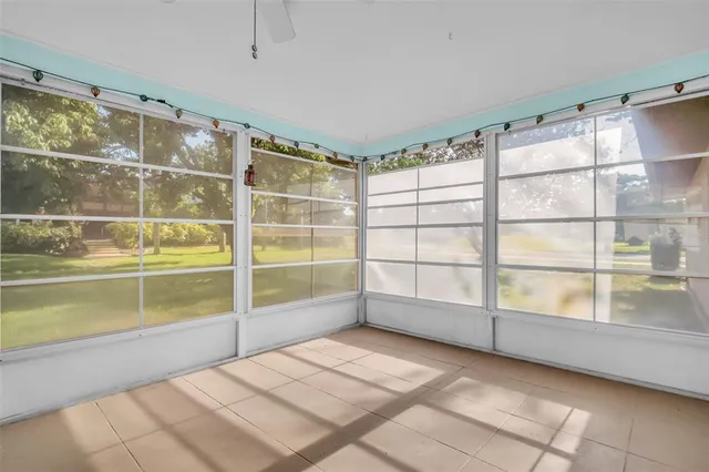 an aerial view of a house with yard swimming pool and outdoor seating