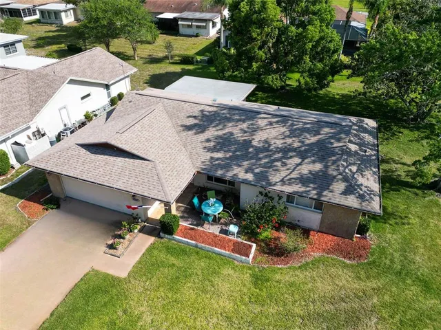 a view of a swimming pool and a garden