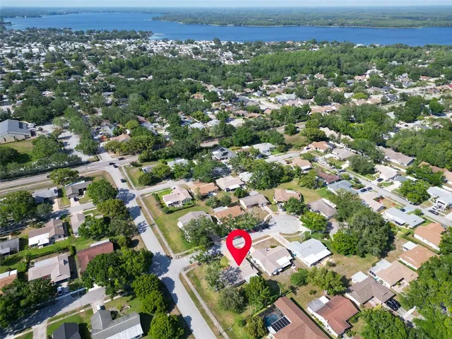 an aerial view of a house with a garden