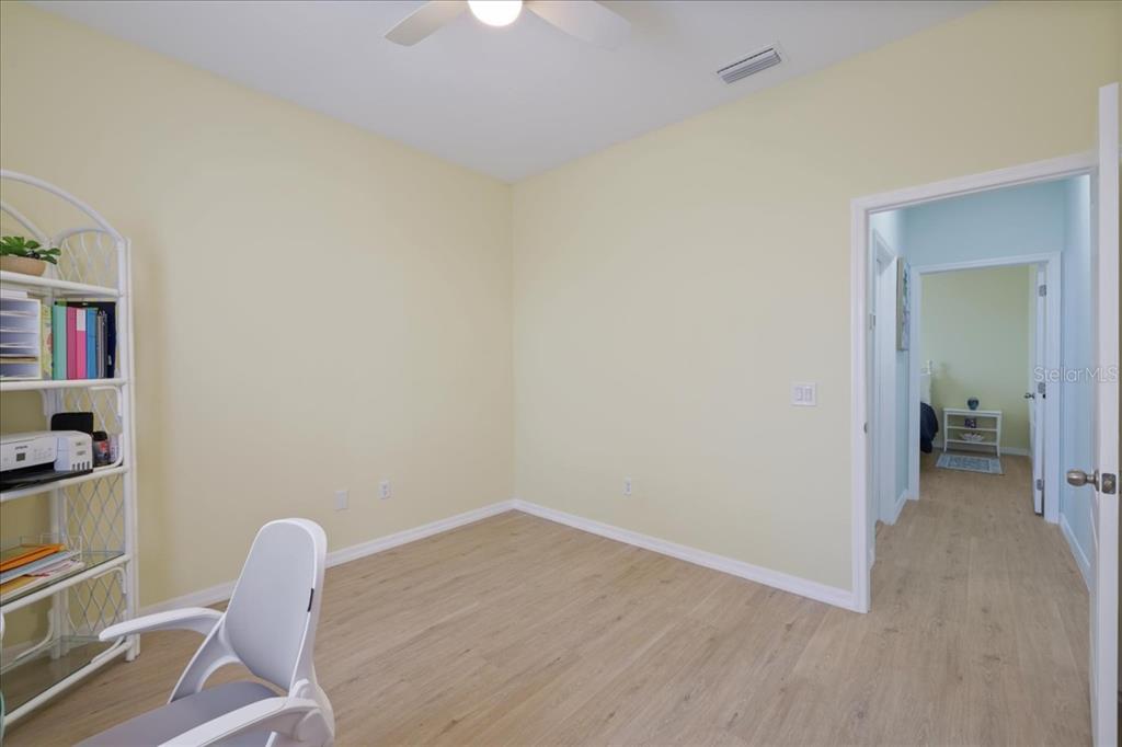 8 Abaft Place Placida, FL 33946 - Photo 20 of 45 a view of room with furniture and wooden floor