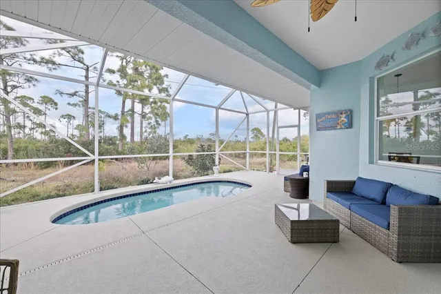 a view of a swimming pool with a porch