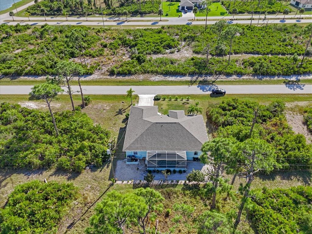 8 Abaft Place Placida, FL 33946 - Photo 36 of 45 an aerial view of a house with a yard and lake view