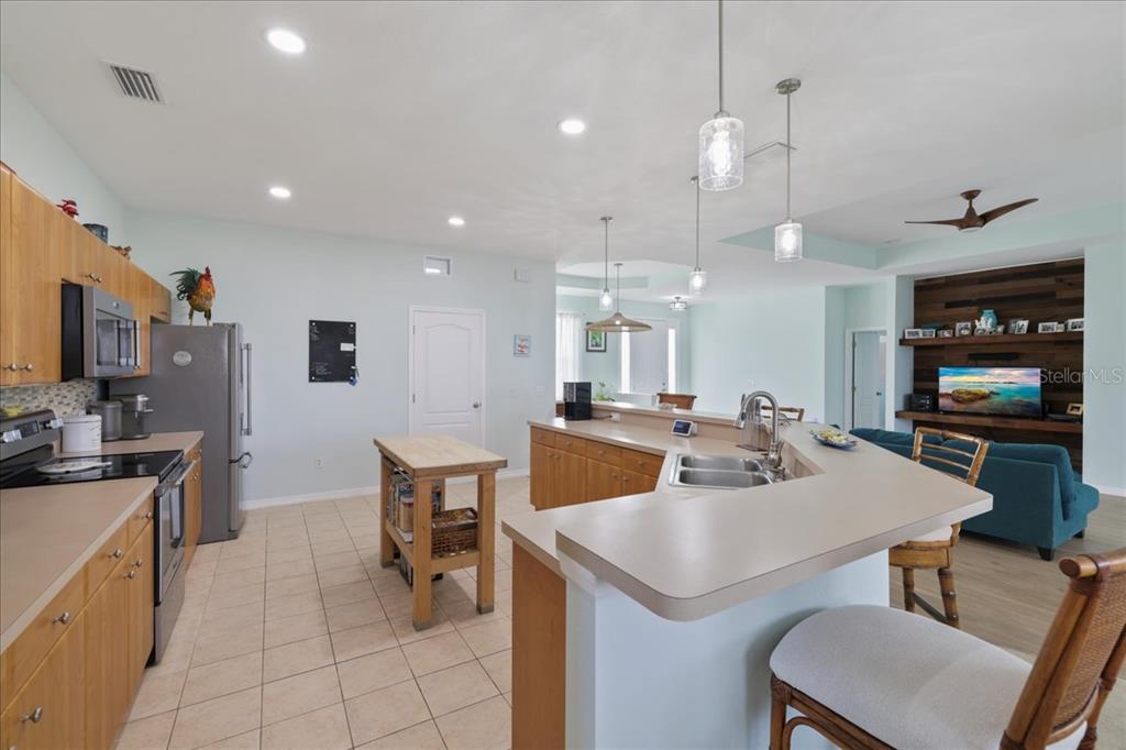 8 Abaft Place Placida, FL 33946 - Photo 9 of 45 a kitchen with a sink a counter space and appliances