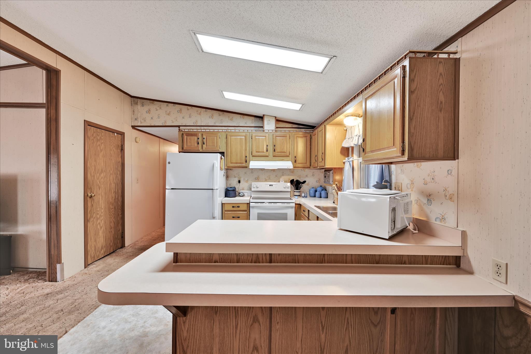64 Maple Avenue Manheim, PA 17545 - Photo 15 of 36 a view of kitchen with furniture and refrigerator