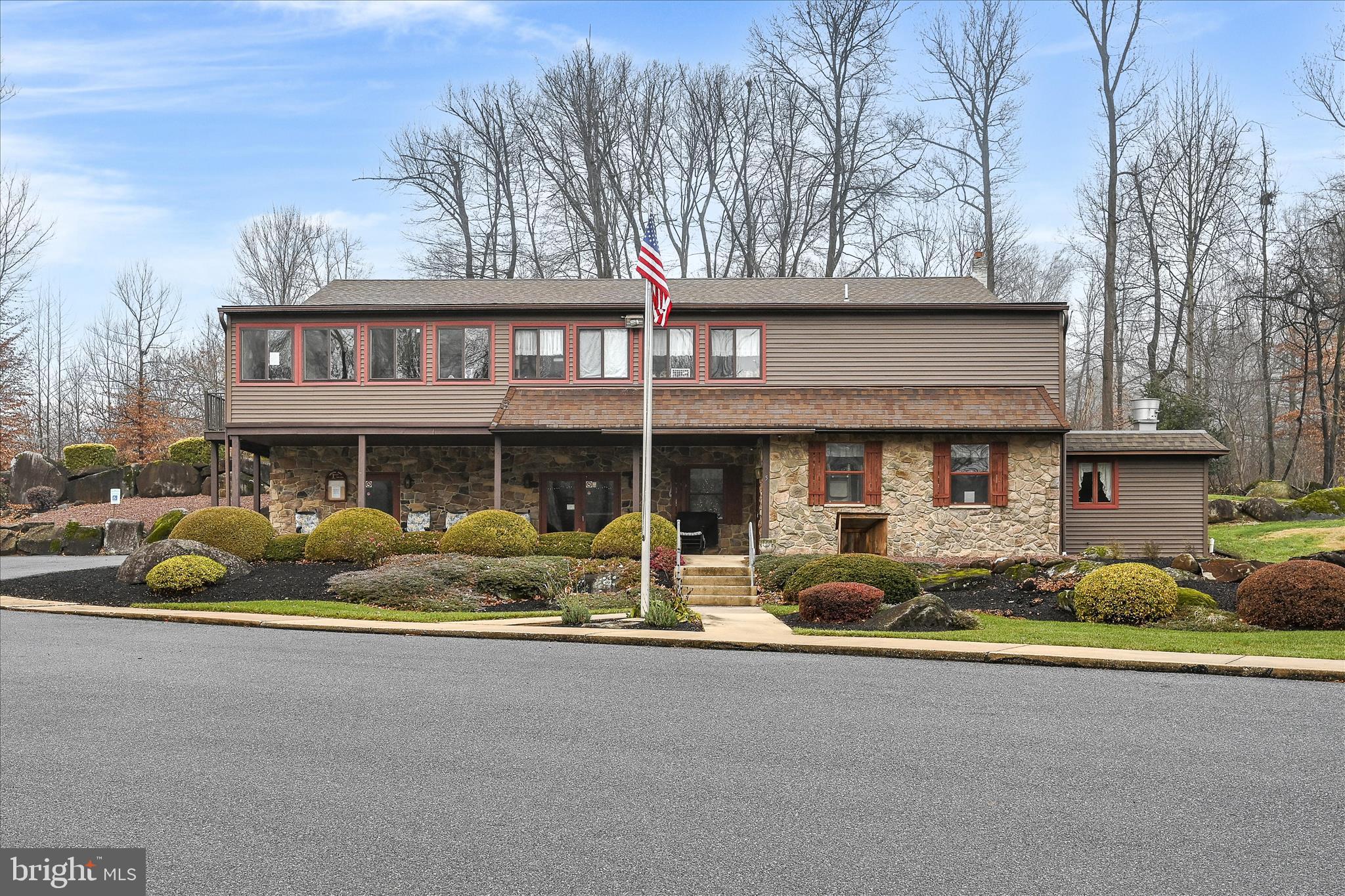 64 Maple Avenue Manheim, PA 17545 - Photo 36 of 36 a front view of a house with garden