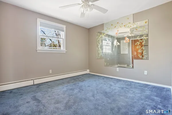a view of an empty room and window