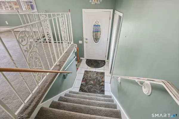 an empty room with entrance and door