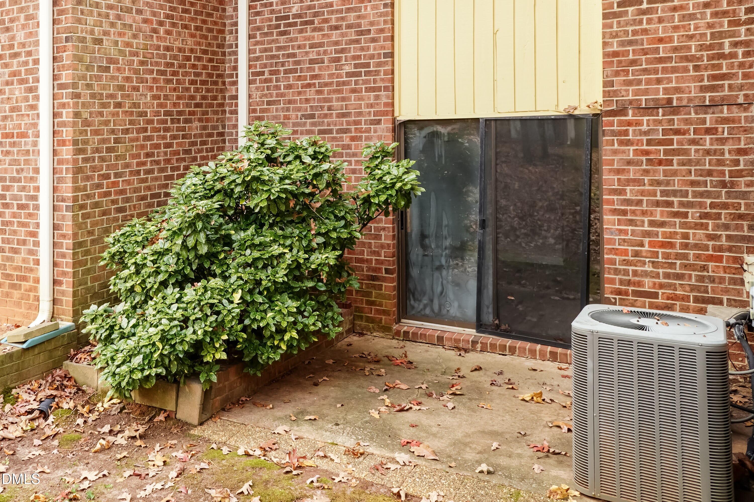 1231 Schaub Drive Raleigh, NC 27606 - Photo 18 of 23 a view of a pathway with a house