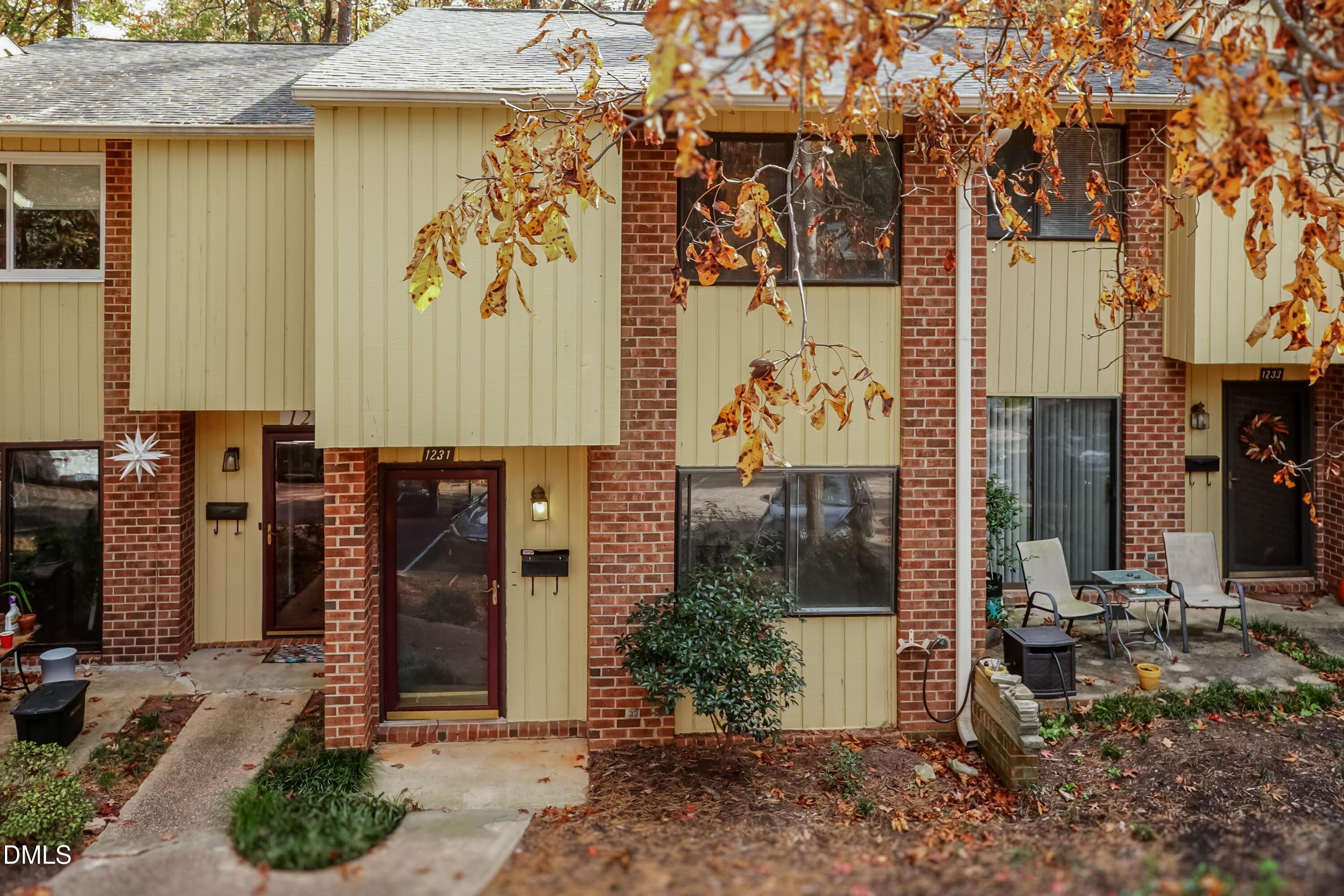 1231 Schaub Drive Raleigh, NC 27606 - Photo 2 of 23 a front view of a house