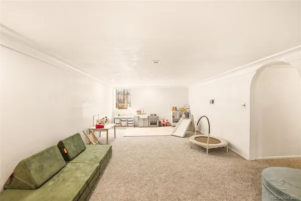 a living room with furniture and a couch