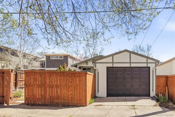 a front view of a house with a garage