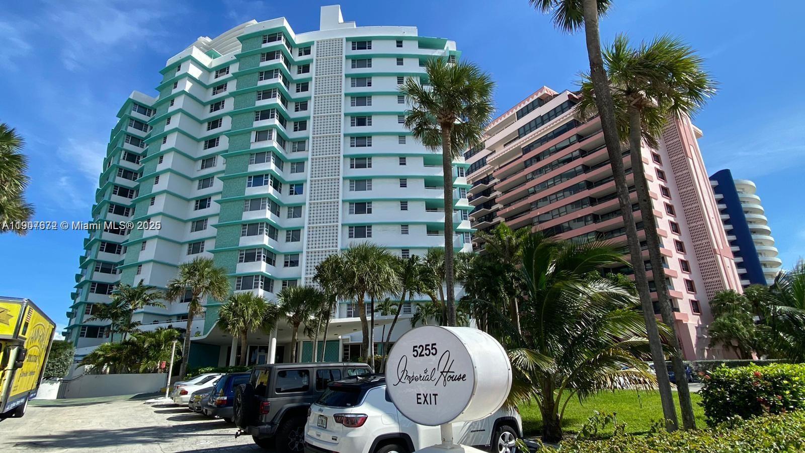 5255 Collins Avenue, Unit 7B Miami Beach, FL 33140 - Photo 1 of 12 a front view of a multi story building