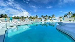 5255 Collins Avenue, Unit 7B Miami Beach, FL 33140 - Photo 2 of 12 a view of lake from yard