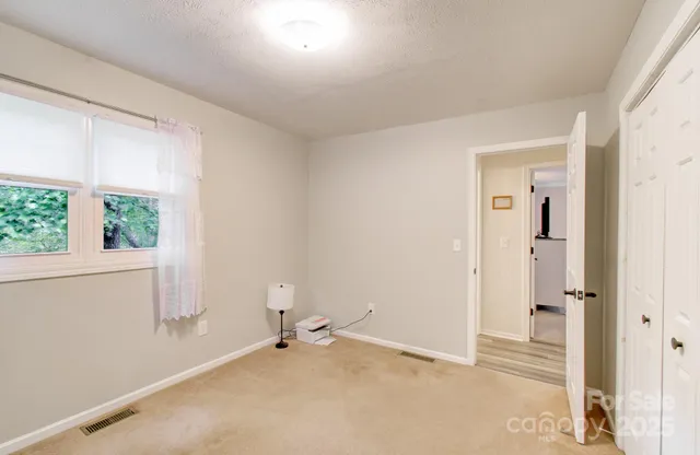 a room with furniture and window