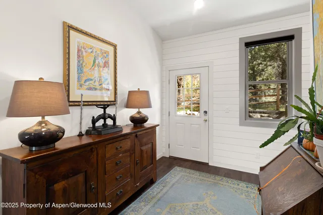 a bed room with a bed and a window