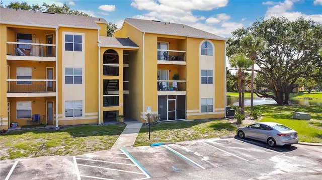 a view of a building with a yard