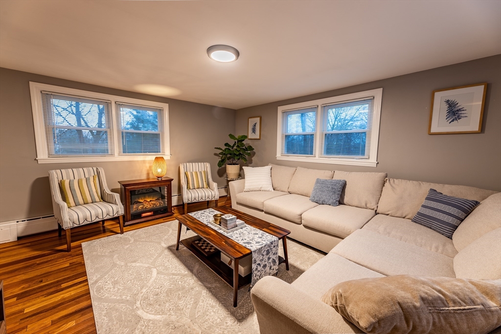 32 Farmington Street, Unit 1 Worcester, MA 01603 - Photo 6 of 25 a living room with furniture and large window