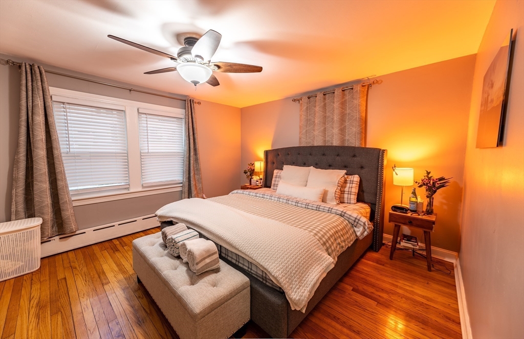 32 Farmington Street, Unit 1 Worcester, MA 01603 - Photo 8 of 25 a bedroom with a bed and window