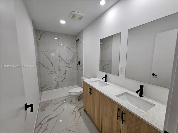 a view of a room with racks on the wall