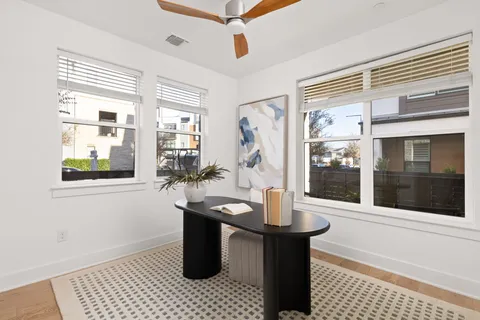 a dining table chair with a large window