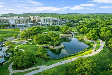 a view of a lake with a yard
