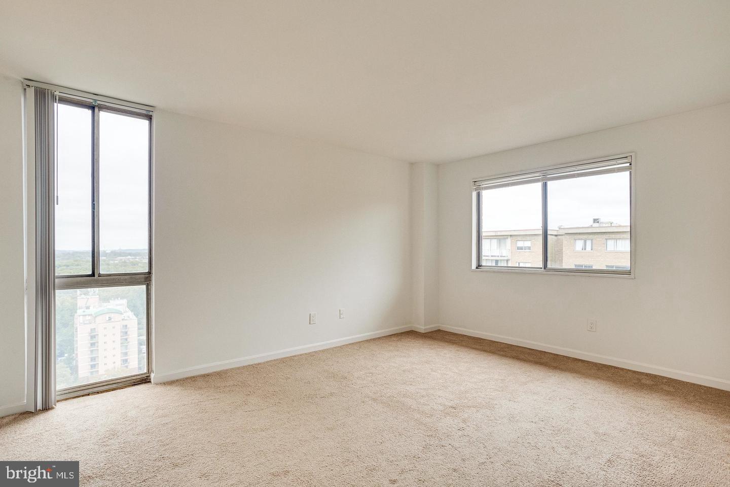 1836 Metzerott Road, Unit 2025 Adelphi, MD 20783 - Photo 16 of 21 an empty room with windows