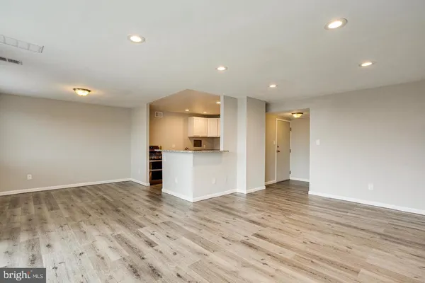 a view of kitchen with wooden floor