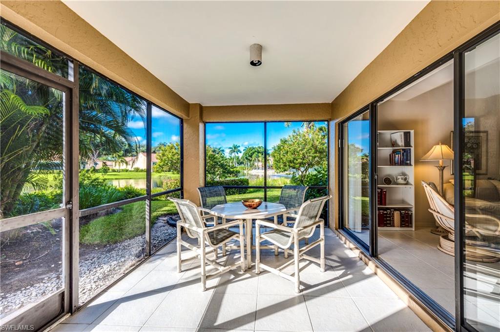 867 Reef Point Circle Naples, FL 34108 - Photo 1 of 32 Sunny southern exposure and pretty lake views