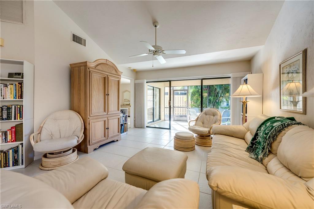 867 Reef Point Circle Naples, FL 34108 - Photo 15 of 32 Master Bedroom is privately located at opposite end of Living Room