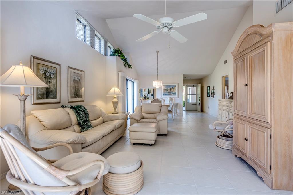 867 Reef Point Circle Naples, FL 34108 - Photo 2 of 32 Vaulted ceilings and spacious, light & bright living area
