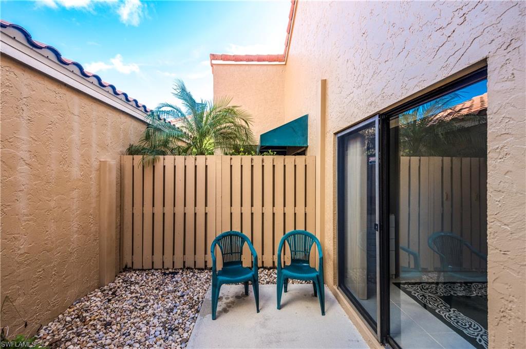 867 Reef Point Circle Naples, FL 34108 - Photo 21 of 32 Open-air patio off second bedroom/office