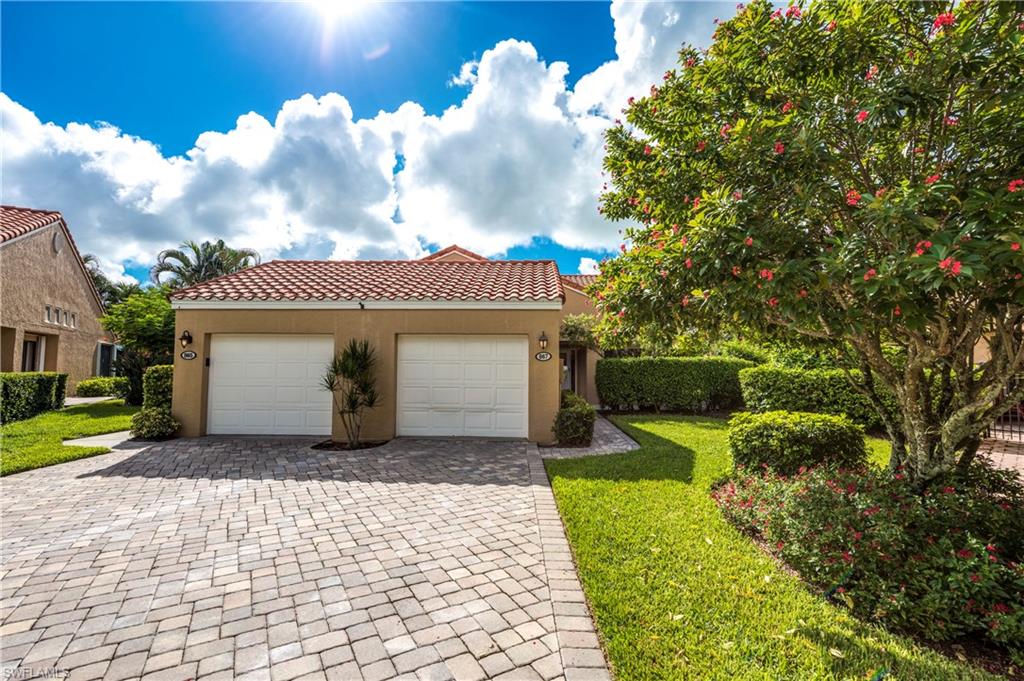 867 Reef Point Circle Naples, FL 34108 - Photo 3 of 32 Private detached 1-car garage located right outside villa